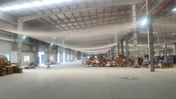 Open warehouse floor with cartons staged for despatch